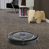 Black Pursonic i7 Pro robotic vacuum cleaner on carpeted floor with paper elephant