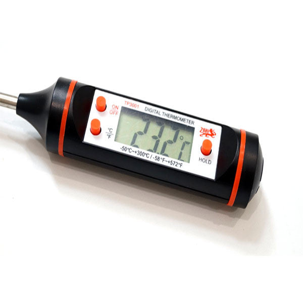 meat thermometer close up white background